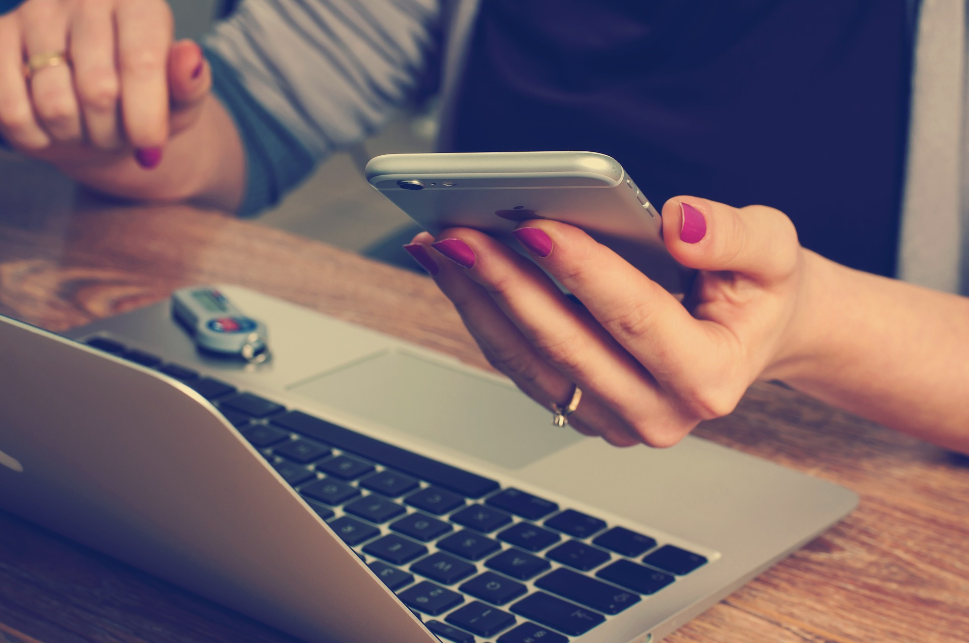 Woman interacting with Apple products